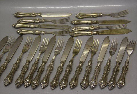 Unknown ? EPNS Silverplated and stainless steel with heavy handle. 24 knives and forks sold together