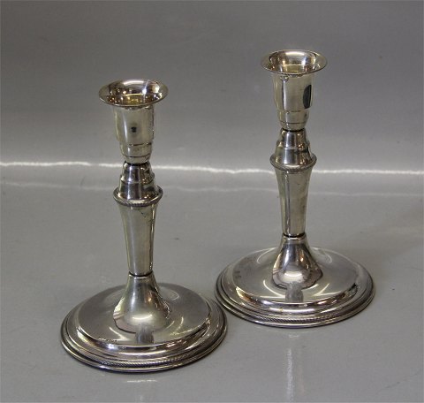 Pair of Silver candlestick Danish Silver smith Svend Toksvaerd 15 cm Marked 830 S and  Sv.T. Foot filled with plaster