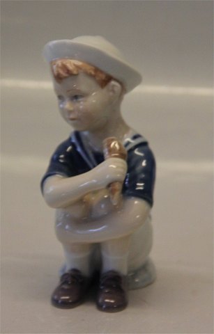 Royal Copenhagen figurine 0680 RC Boy "Jens" with icecream 12 cm (2021680)