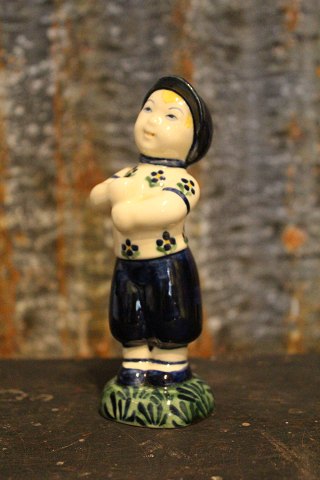 Little brother figure in earthenware Aluminia porcelain factory, Copenhagen - Denmark.
