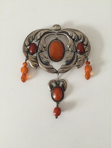 Art Nouvau one of kind jewelry piece with amber of unknown artist. From 1910-1920.