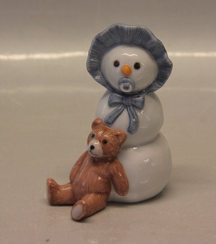 Royal Copenhagen figurine 0019 RC Snowman, baby boy in blue har with teddy  9 cm (1249019) Allan Therkelsen