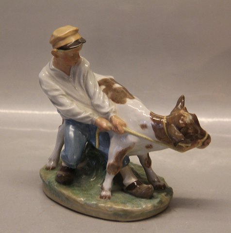 Royal Copenhagen figurine 0772 RC Boy with Calf Chr. T.  1906 6.5" Over glaze decoration