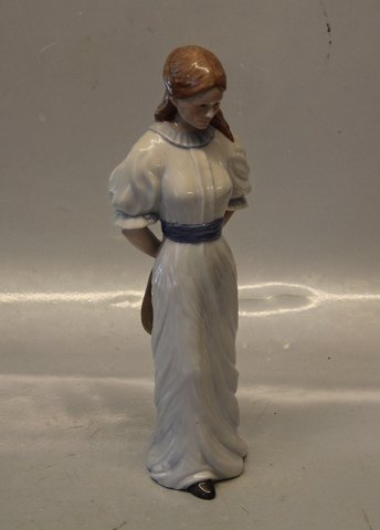 Royal Copenhagen figurine 050 RC Lady Walking with Hat Behind Her, 26 cm (1249050) Scandinavian women series, Allan Therkelsen