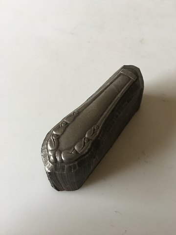 Georg Jensen Lily of the Valley paperweight in steel. A press for a knife handle.