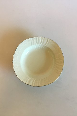 Royal Copenhagen Creme Svejfet med Guld (Stel 1235) Dyb Desserttallerken No. 1616