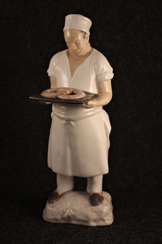 Porcelæns figur af bager fra Bing & Grøndahl.Højde:28cm.Dekorations nummer : 2223.
