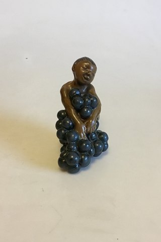 Bing & Grøndahl Figurine by Kai Nielsen "Little Bacchus with Grapes" No 4027 from The Grape Harvest Series