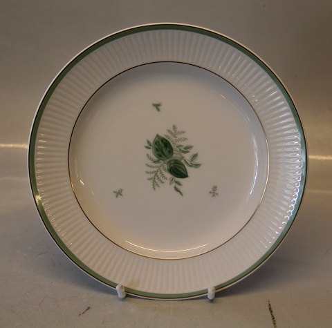 1513-14063 Tallerken 21 cm Grøn Melodi #1513 (Kgl.) Rillet form, hvid glasur, grøn dekoration, grønt bånd og guldfilet.