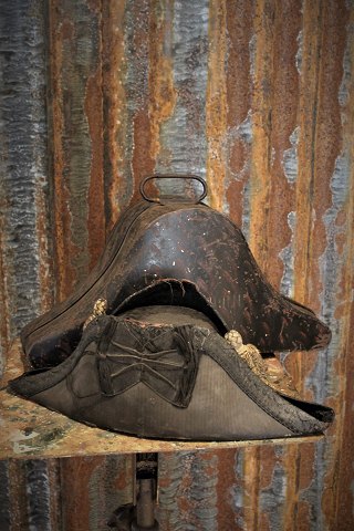 Old decorative, French "Napoleon hat" with a super fine patina in original metal hat box.