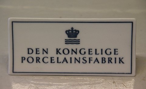 Kongelig Dansk Forhandlerskilt til bord eller hylde 6.5 x 14 cm Den Kongelige Porcelainsfabrik