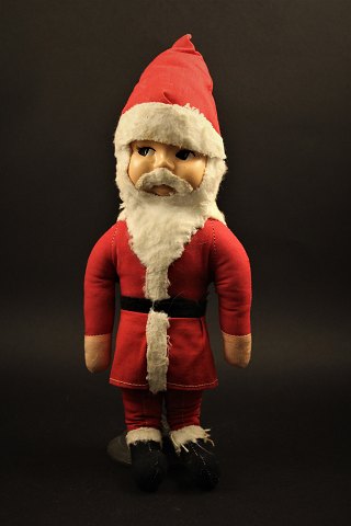 Old Santa Claus Santa Claus in fabric with celluloid face.Height: 33cm.