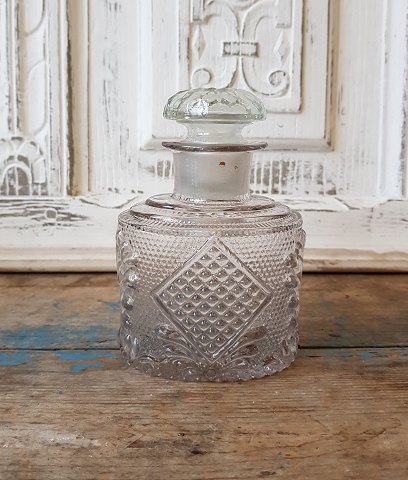 1800s tea box in glass
