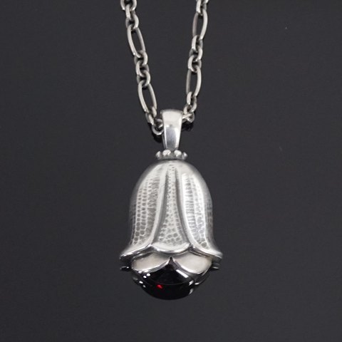 Georg Jensen; Heritage jewellery, 2007, made of sterling silver set with a garnet