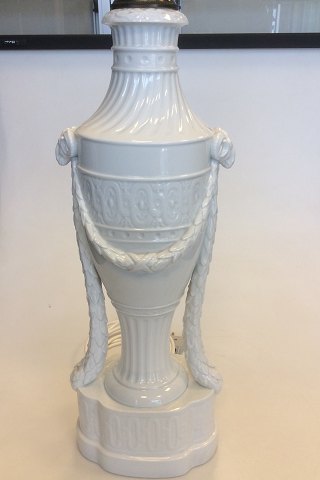Royal Copenhagen baluster-shaped lamps on base decorated with garlands, Ram heads With Juliane Marie Stamp from 1905-12. Mounted wire.