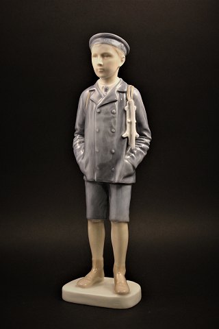 Sjælden porcelæns figur fra Bing & Grøndahl ( år 1915 ) af dreng med skøjter. H:29,5cm...