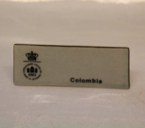 Dansk B&G Columbia  Stentøjstel Stoneware Skilt for  Columbia   ca 4 x 10 cm