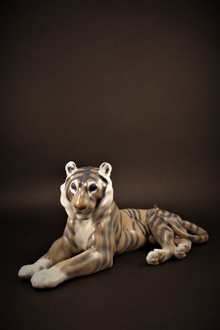 Royal Copenhagen porcelain figure of tiger, H:13cm. L:30.5cm. RC# 714.