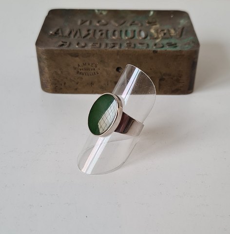 N.E.From silver ring with jade