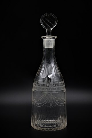 Fine old liquor glass carafe with fine grindings.H:26cm. Dia:8,5 cm.
