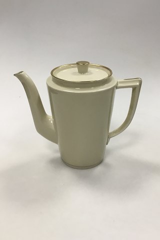 Royal Copenhagen Plain Creme pattern with gold rim Coffee Pot No 9533. Measures 19 cm (7 31/64 in).