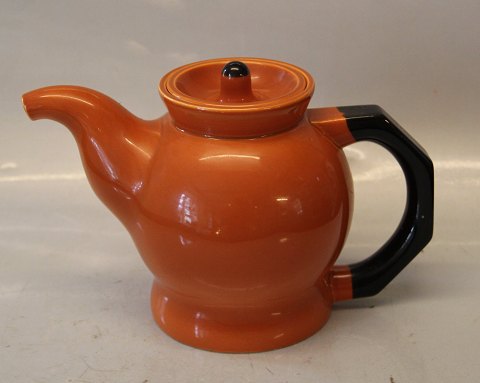 141 Tea pot, ochre 1 l (1191141-34700) 142 -143 Ursula Tableware  The original Royal Copenhagen Faience