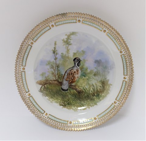 Royal Copenhagen. Fauna Danica. Jagtstel.  Frokost tallerken. Model # 239 - 3550. Diameter 22 cm. (1 sortering). Tetrao bonasia. Tallerken er med reparation. (se foto)