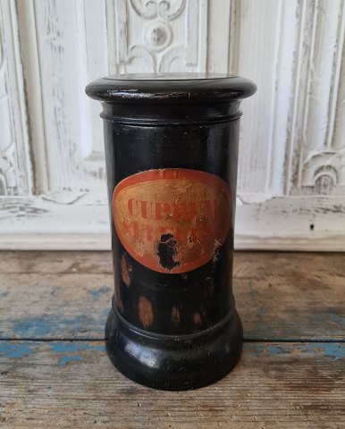 Old pharmacy jar in wood