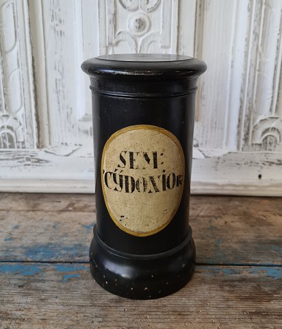Old pharmacy jar in wood