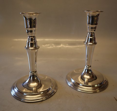 Pair of Silver candlestick Danish Silver smith Svend Toksvaerd 16 cm Marked 830 S and  Sv.T Foot filled with plaster