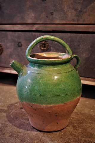 Old 1800s pottery jars with pouring spouts from the South of France in green glaze…