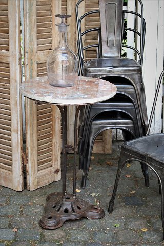 Old French cafe table with fine cast iron base and marble top with a really nice patina...