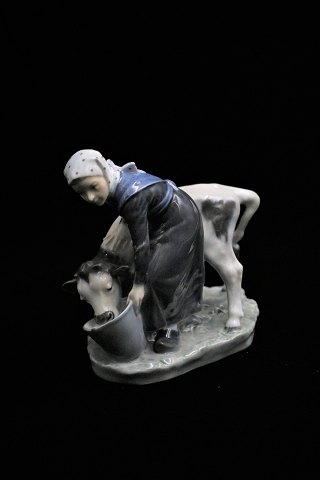Royal Copenhagen porcelain figure of milkmaid with calf...RC#779.