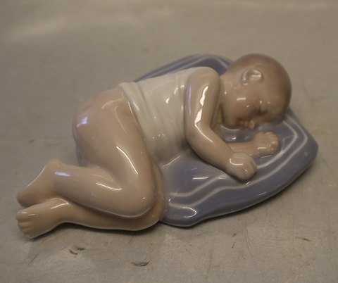 Art Nouveau 4496 RC Child sleeping on a pillow  4 x 15 x 10 cm Holger Christensen Royal Copenhagen
