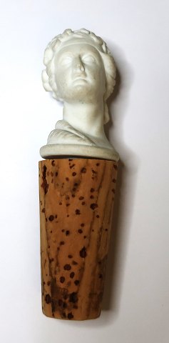 Vinprop i form af kvinde buste med korkprop. Formentlig fra Royal Copenhagen. Højde på buste 4 cm.
