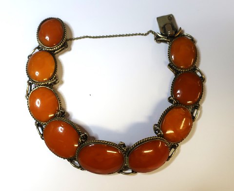 Latvia. Stamped WL. Gold-plated silver bracelet with amber. (875). Several amber pieces have small chips.