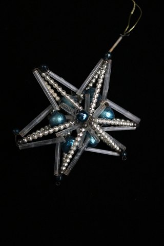Old Christmas tree decoration in the shape of Christmasstar made of small glass balls and tubes from around 1940...