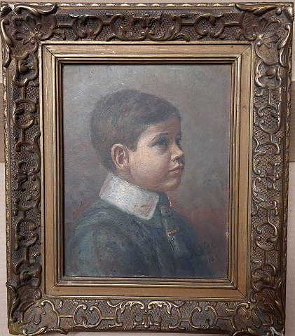 Portrait of young boy in plaster/wooden frame 1916​