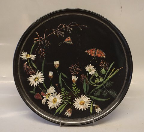 108 Black Teracotta platter 27 cm  decorated with flowers and butterflies ca 1890 Ipsen Danish Art Pottery