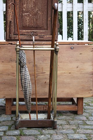 French 19th century brass umbrella stand in super fine quality with cast iron base and metal drip tray...