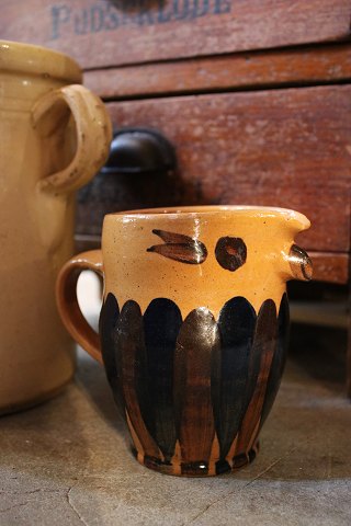 "Lillerød" owl jug in glazed earthenware in fine glaze brownish colors. Height: 13cm...