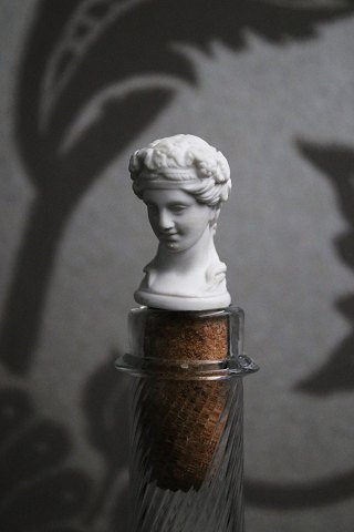 Decorative 19th century wine stopper from Royal Copenhagen in the shape of a woman