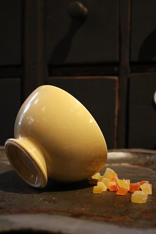Old cafe latte bowl in earthenware with ocher yellow color and fine patina...