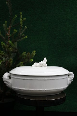 Old Swedish oval Christmas terrine in white porcelain with a lying elf on the lid...