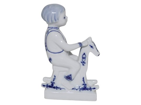 Musselmalet Figur af dreng på gyngehest