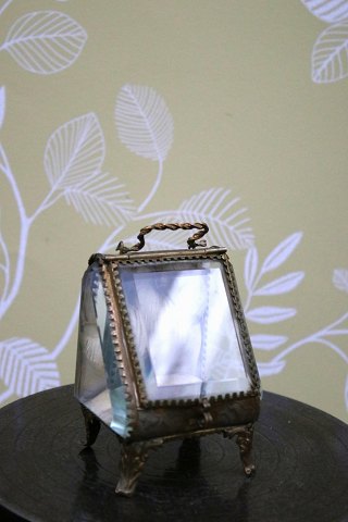 Antique French jewelry box in bronze with faceted glass and silk cushion at the bottom and with a nice old patina...