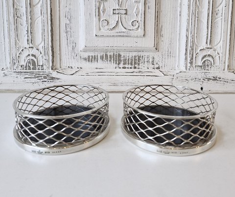 Pair of bottle trays in sterling silver with bakelite bottoms. Designed by Svend Weihrauch for F.Hingelberg.
