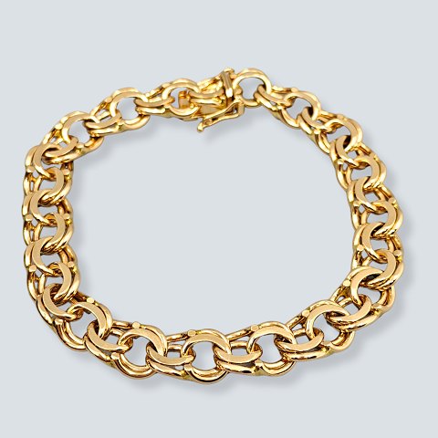 BNH; Kraftigt bismarckarmbånd af 14 kt. guld, bredde 1 cm