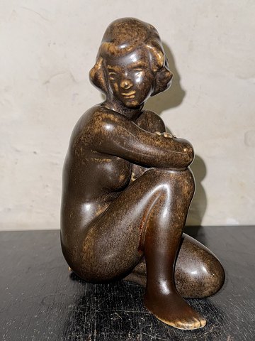 Ceramic figurine of sitting nude woman From Michael Andersen & Son