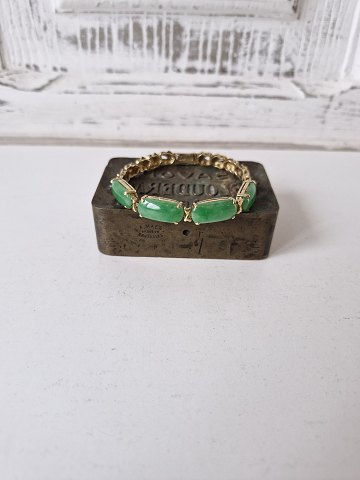 Jade bracelet in 18 kt gold